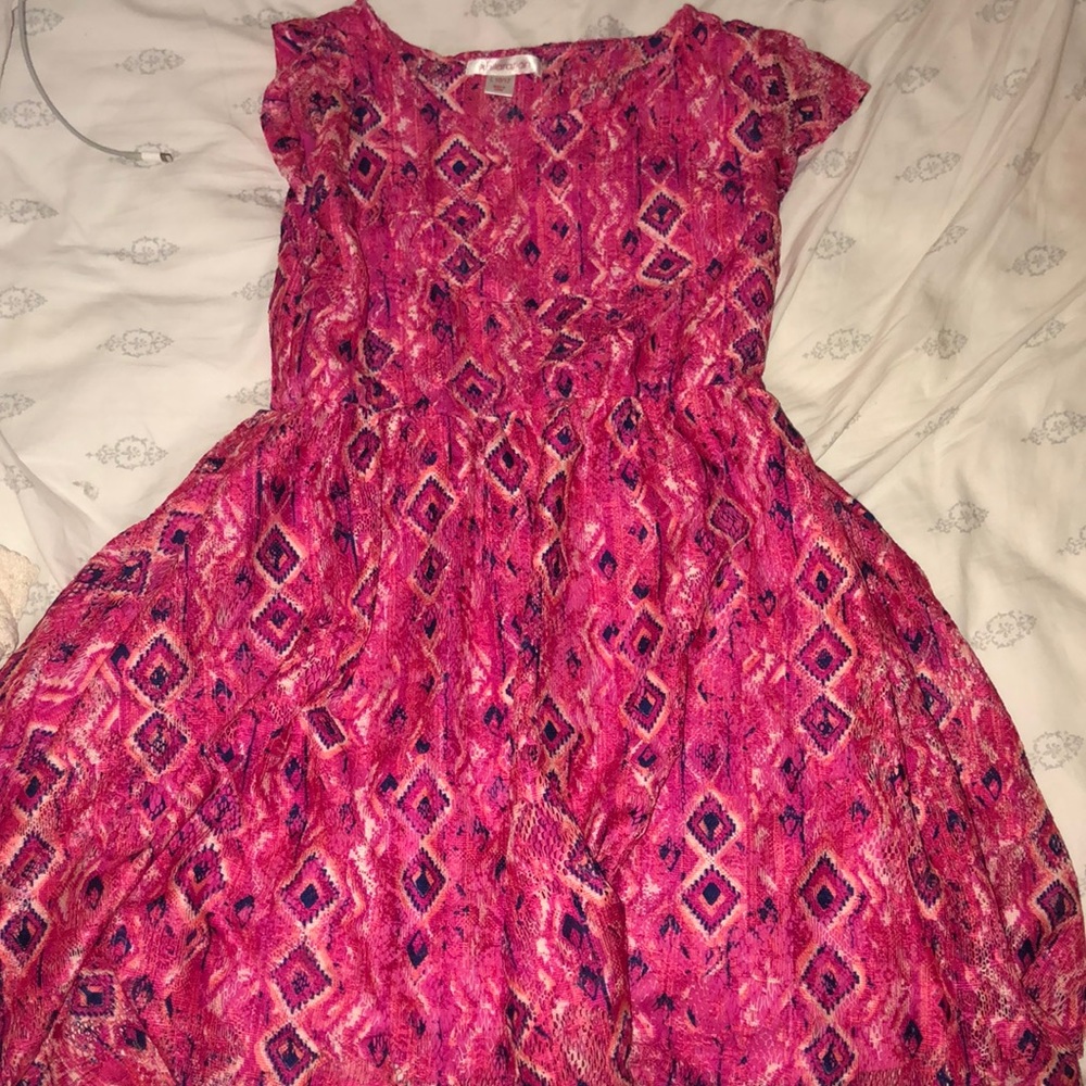 Pink patterned children’s dress.